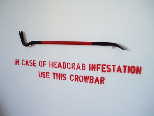 crowbar and sign saying 